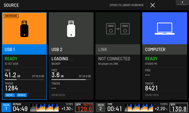 USB1 is being browsed and plays on both decks. USB2 is still loading.